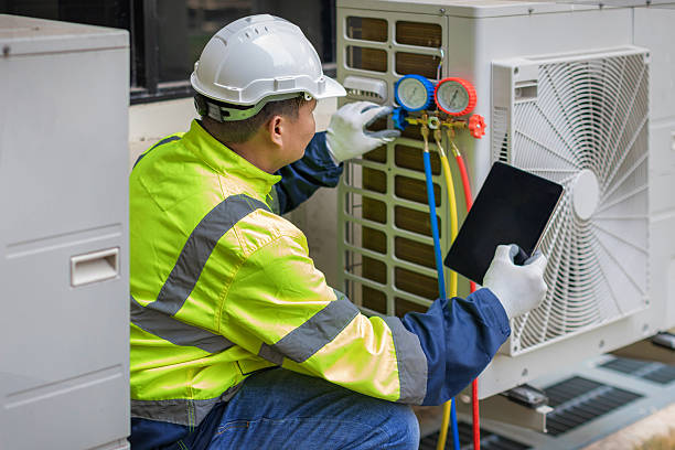 Professional Air Conditioning Repair technician working in South Dartmouth, MA